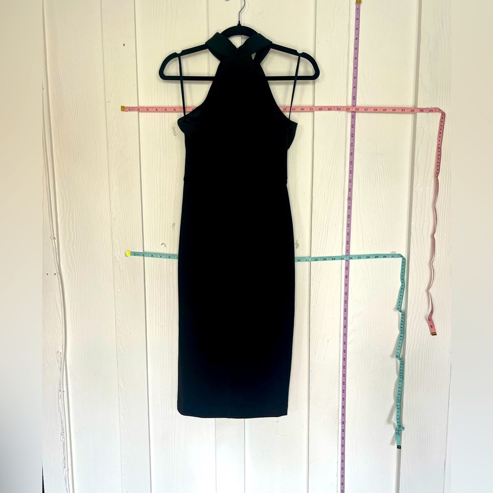 See detail on front. Very sexy halter neck and flattering fit